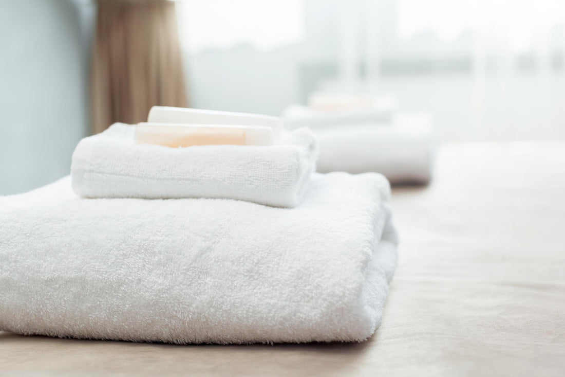 White towels and washcloths in a hotel room